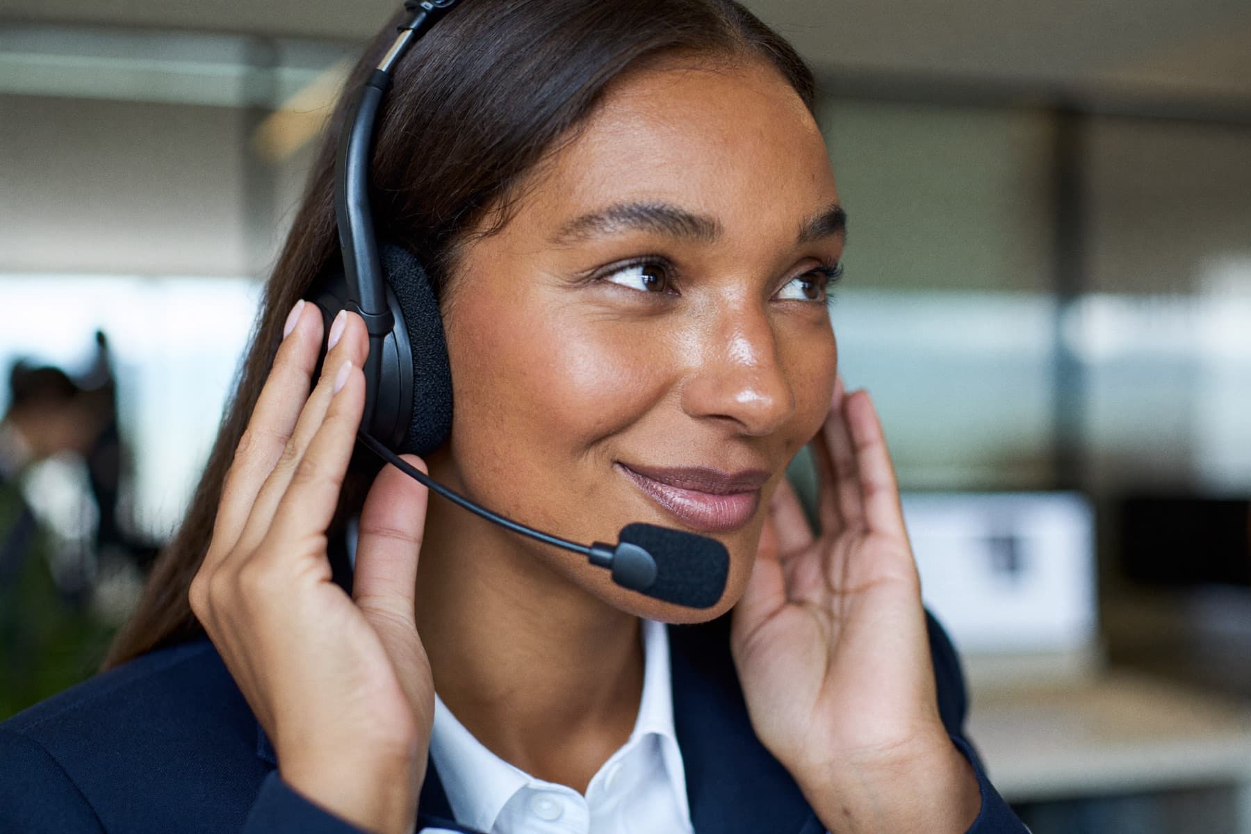 Someone taking a call in a browser with a headset